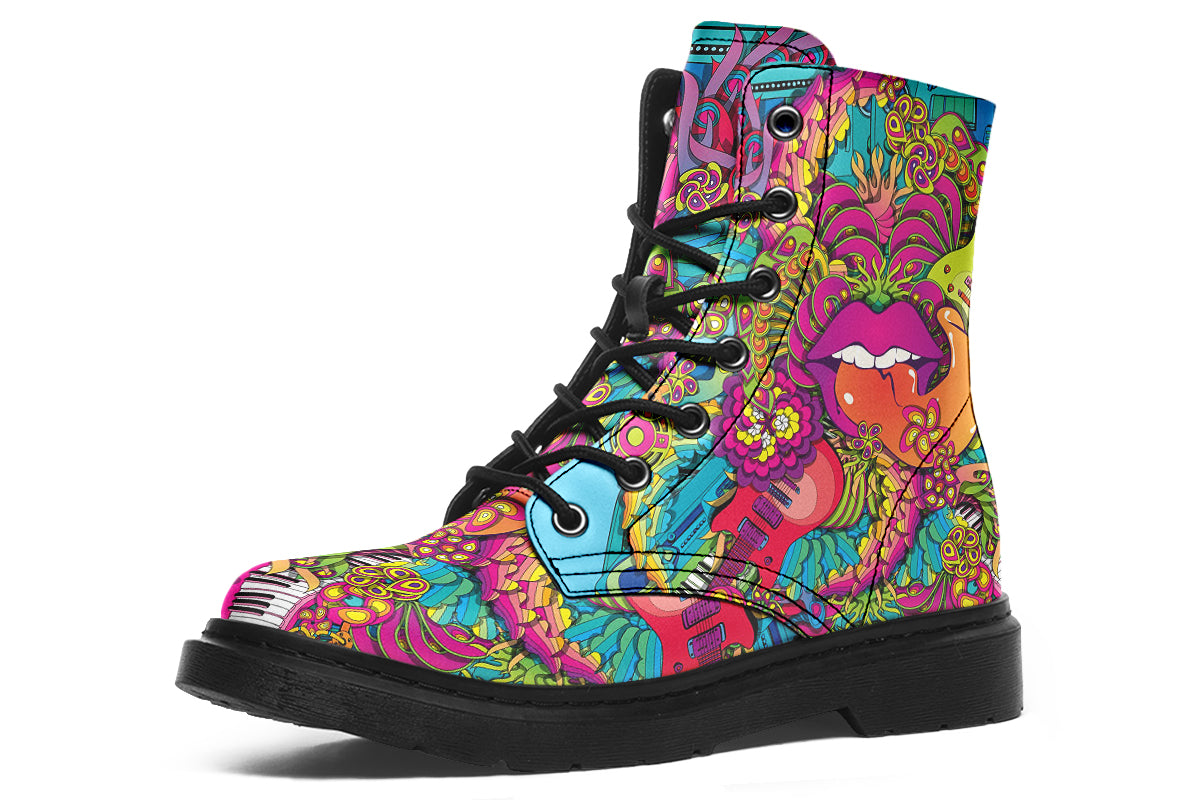 Vibrant, colourful mismatched boots in a design that’s reminiscent of a midcentury psychedelic album cover. The right boot features a peace sign with a flower-patterned guitar in it, surrounded by colourful flowers, a second guitar and other decorative patterns. The left boot features pink lips with a long tongue coming out of them which almost looks like it is licking the guitar next to it. The design has another guitar down the bottom and a busy pattern of colourful florals and swirls.