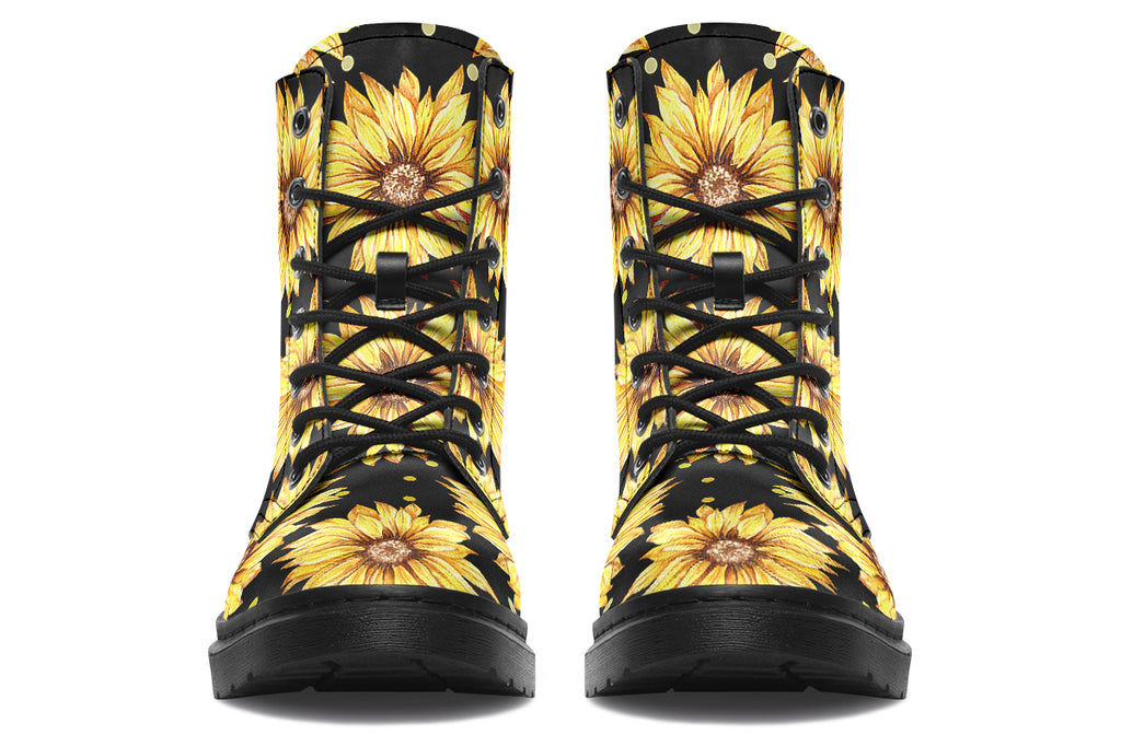 Black boots with a yellow sunflower pattern, with yellow polka dots