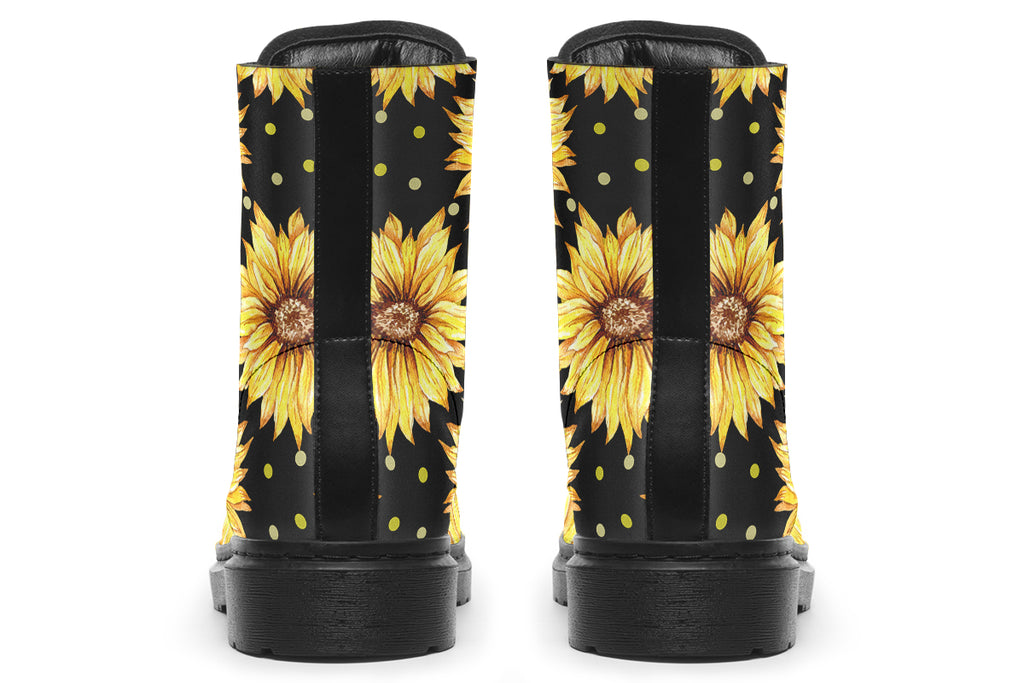 Black boots with a yellow sunflower pattern, with yellow polka dots