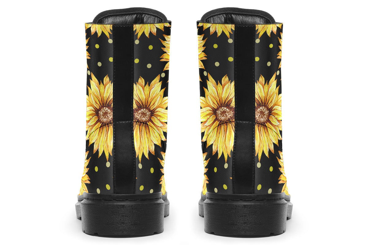 Black boots with a yellow sunflower pattern, with yellow polka dots