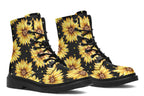 Black boots with a yellow sunflower pattern, with yellow polka dots