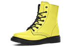 Bright yellow boots with a black sole.