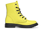 Bright yellow boots with a black sole.