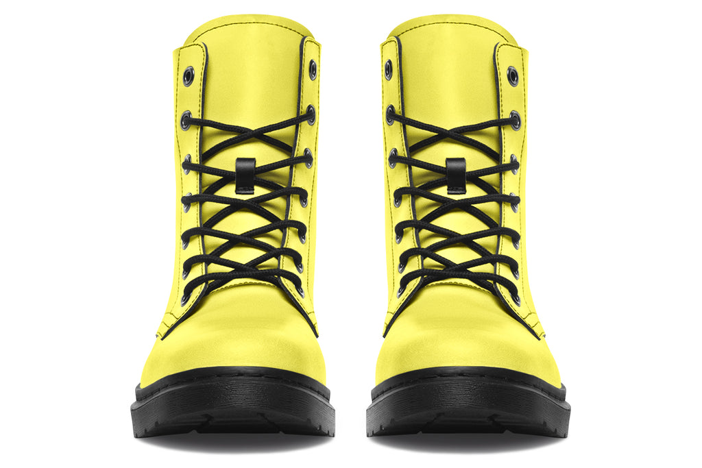 Bright yellow boots with a black sole.