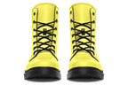 Bright yellow boots with a black sole.