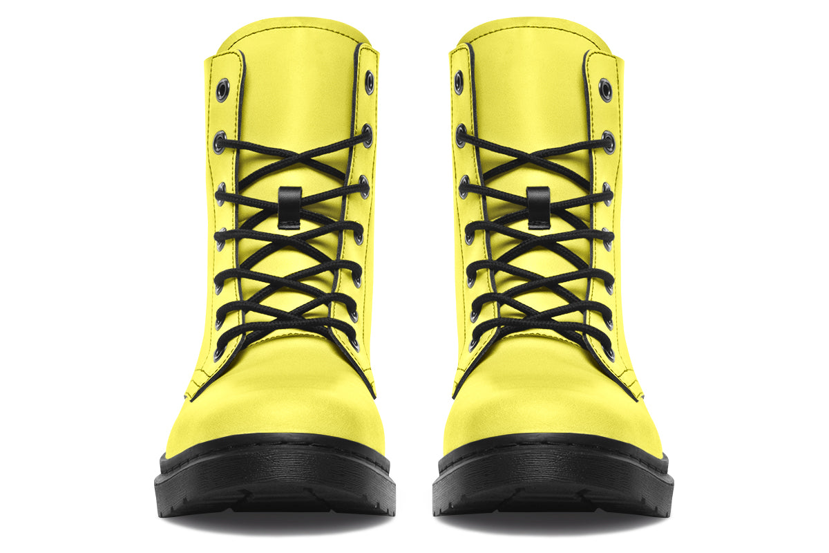 Bright yellow boots with a black sole.