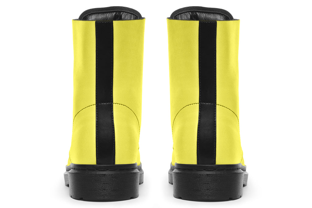 Bright yellow boots with a black sole.