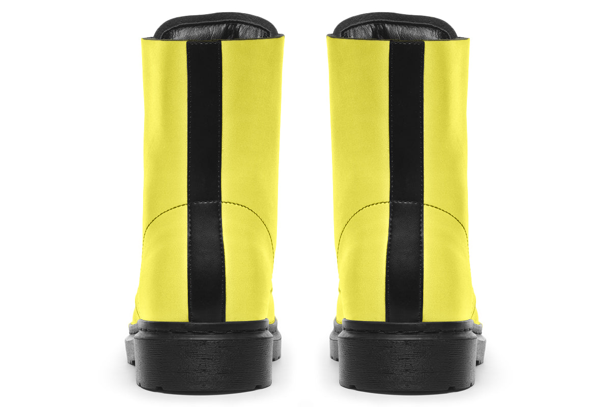 Bright yellow boots with a black sole.