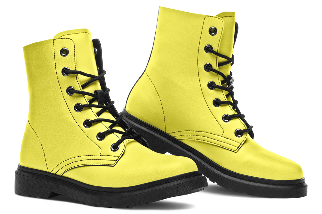 Bright yellow boots with a black sole.