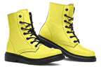 Bright yellow boots with a black sole.