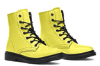 Bright yellow boots with a black sole.