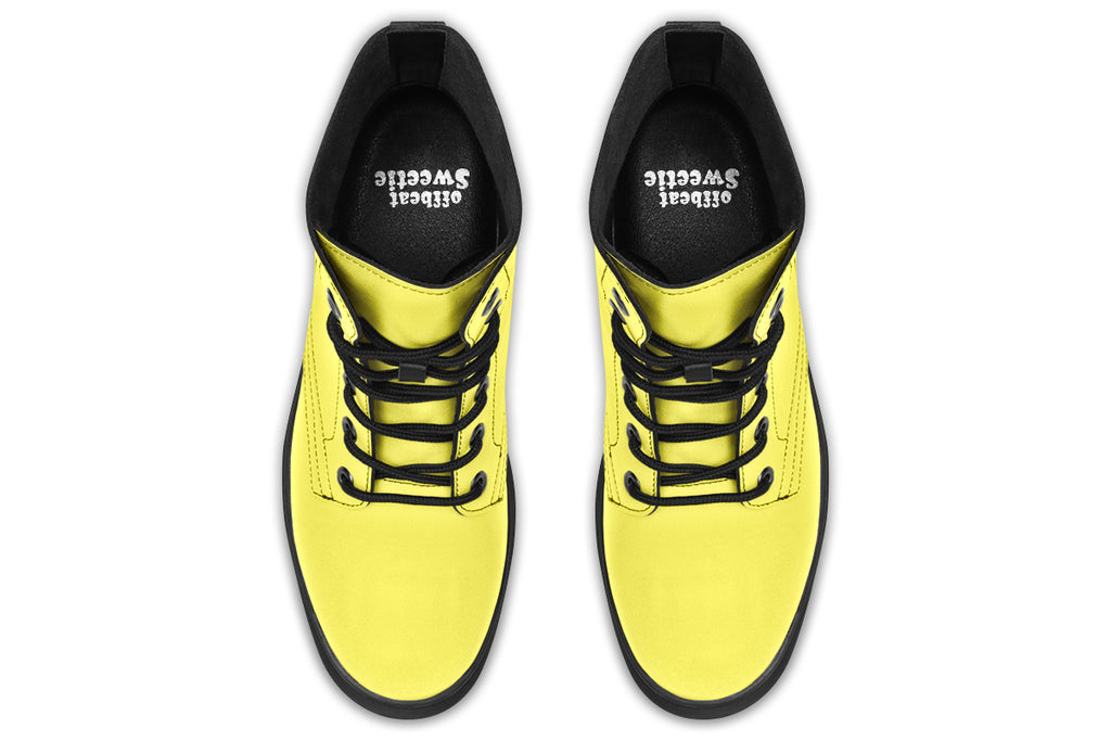 Bright yellow boots with a black sole.