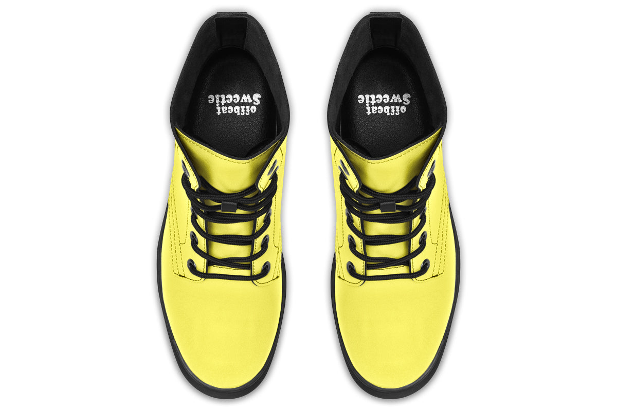 Bright yellow boots with a black sole.