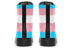 Boots in the colours of the trans flag, blue, pink and white