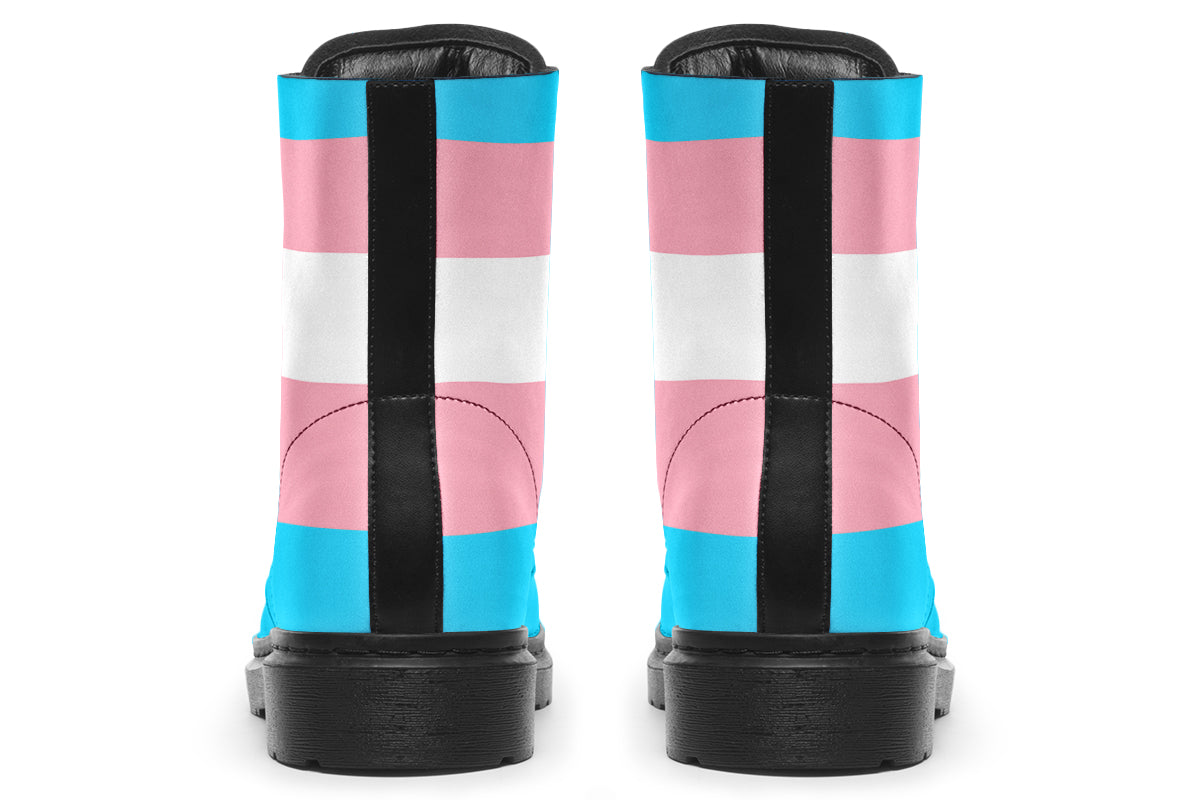 Boots in the colours of the trans flag, blue, pink and white