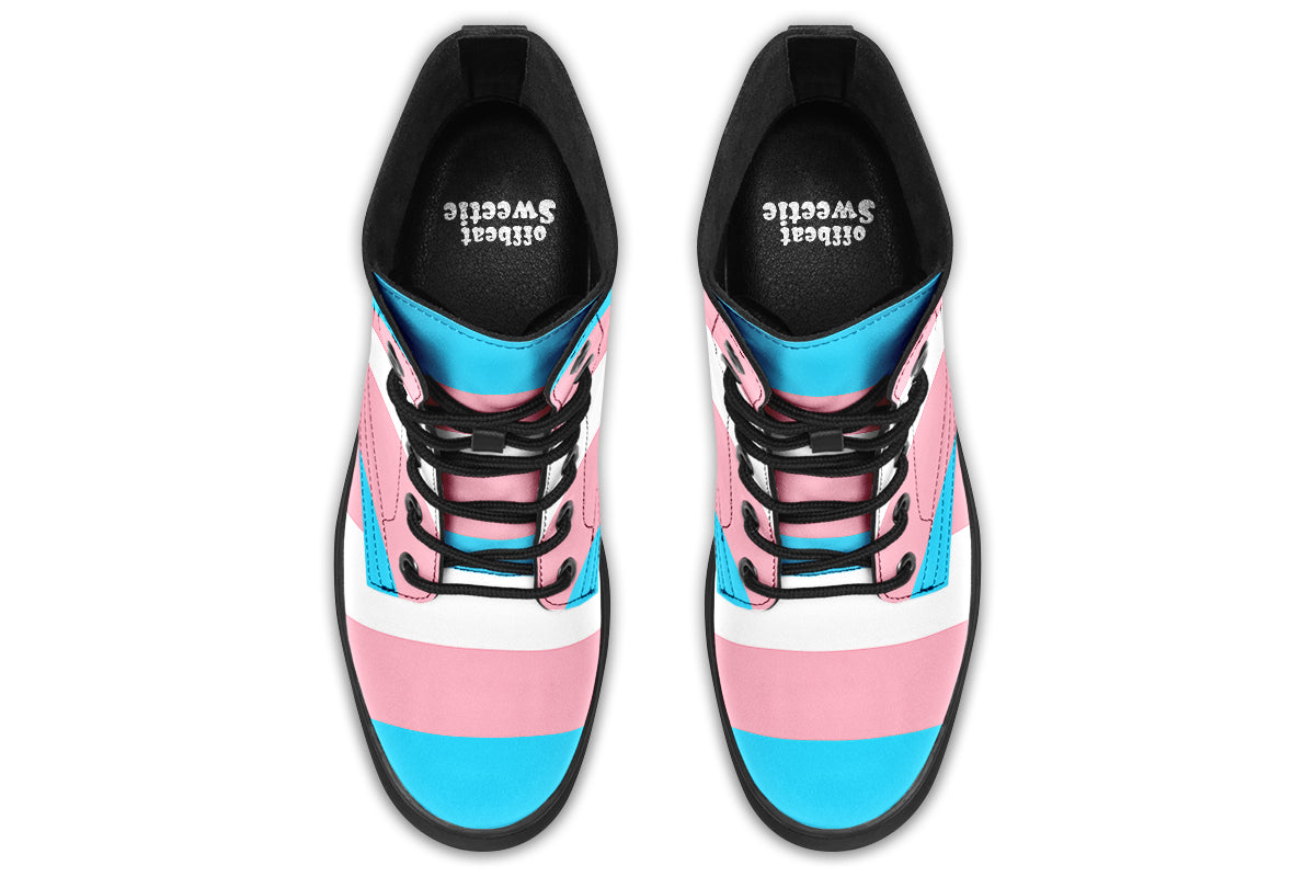 Boots in the colours of the trans flag, blue, pink and white