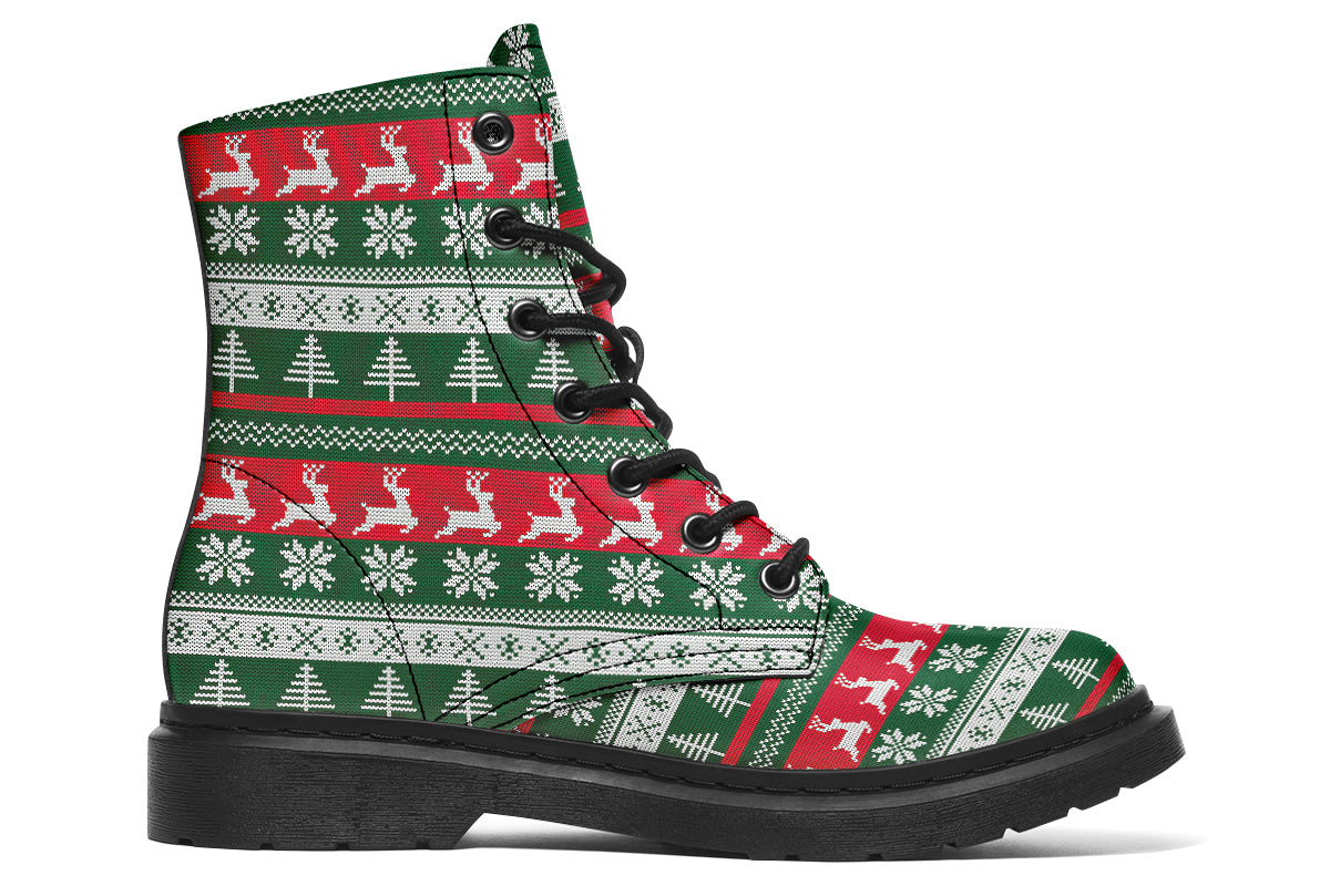 Boots with a red, white and green Christmas pattern in the style of “ugly Christmas sweaters”. The pattern features reindeers, snowflakes and Christmas trees.