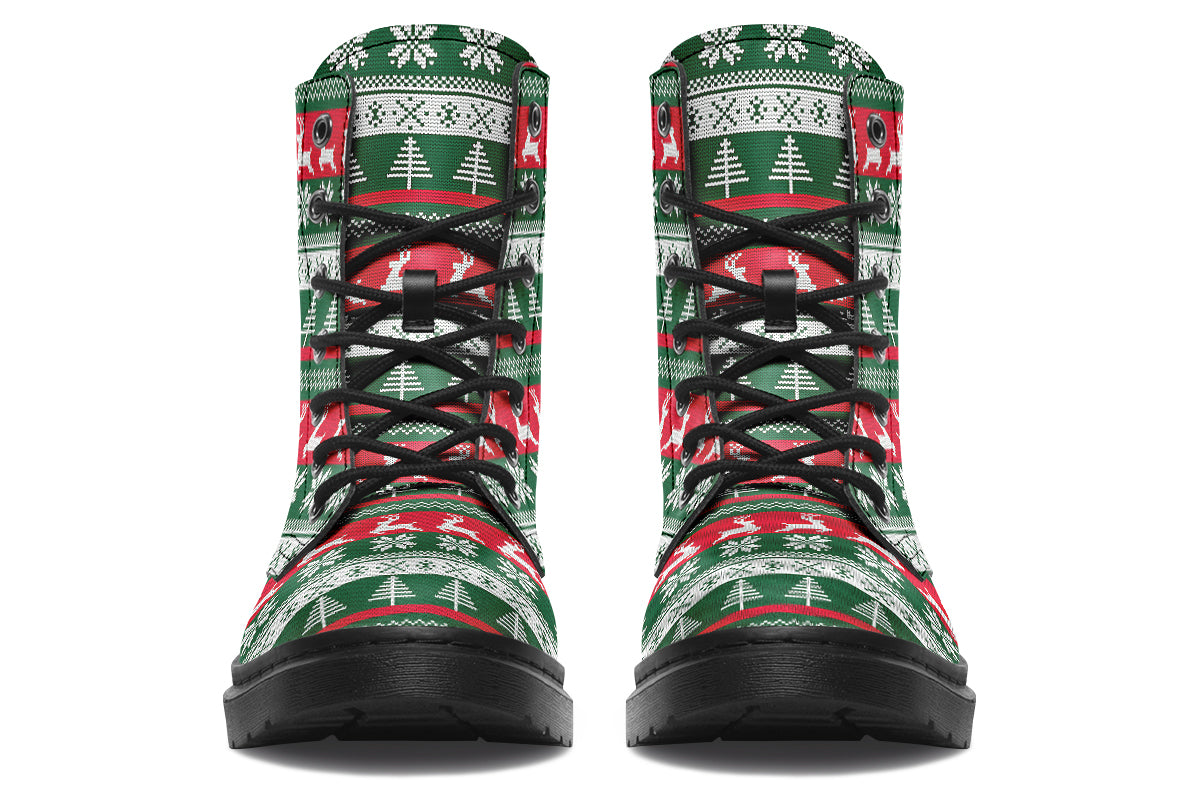 Boots with a red, white and green Christmas pattern in the style of “ugly Christmas sweaters”. The pattern features reindeers, snowflakes and Christmas trees.
