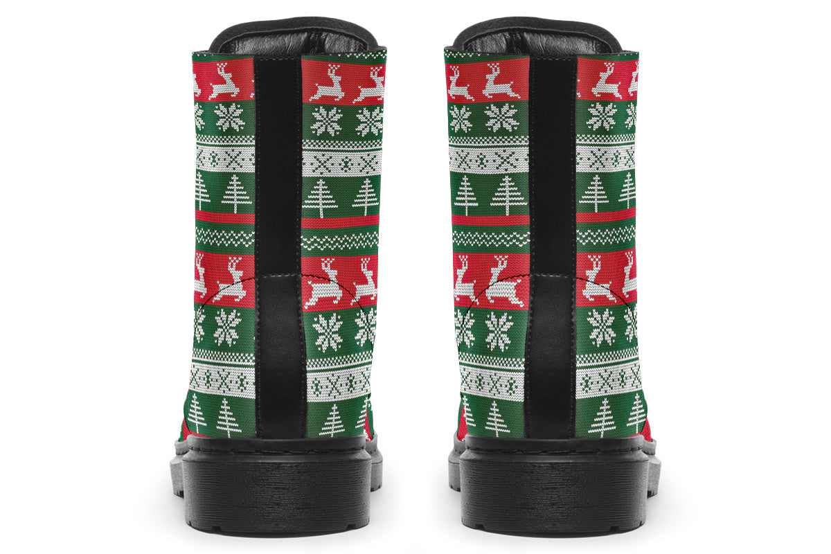 Boots with a red, white and green Christmas pattern in the style of “ugly Christmas sweaters”. The pattern features reindeers, snowflakes and Christmas trees.