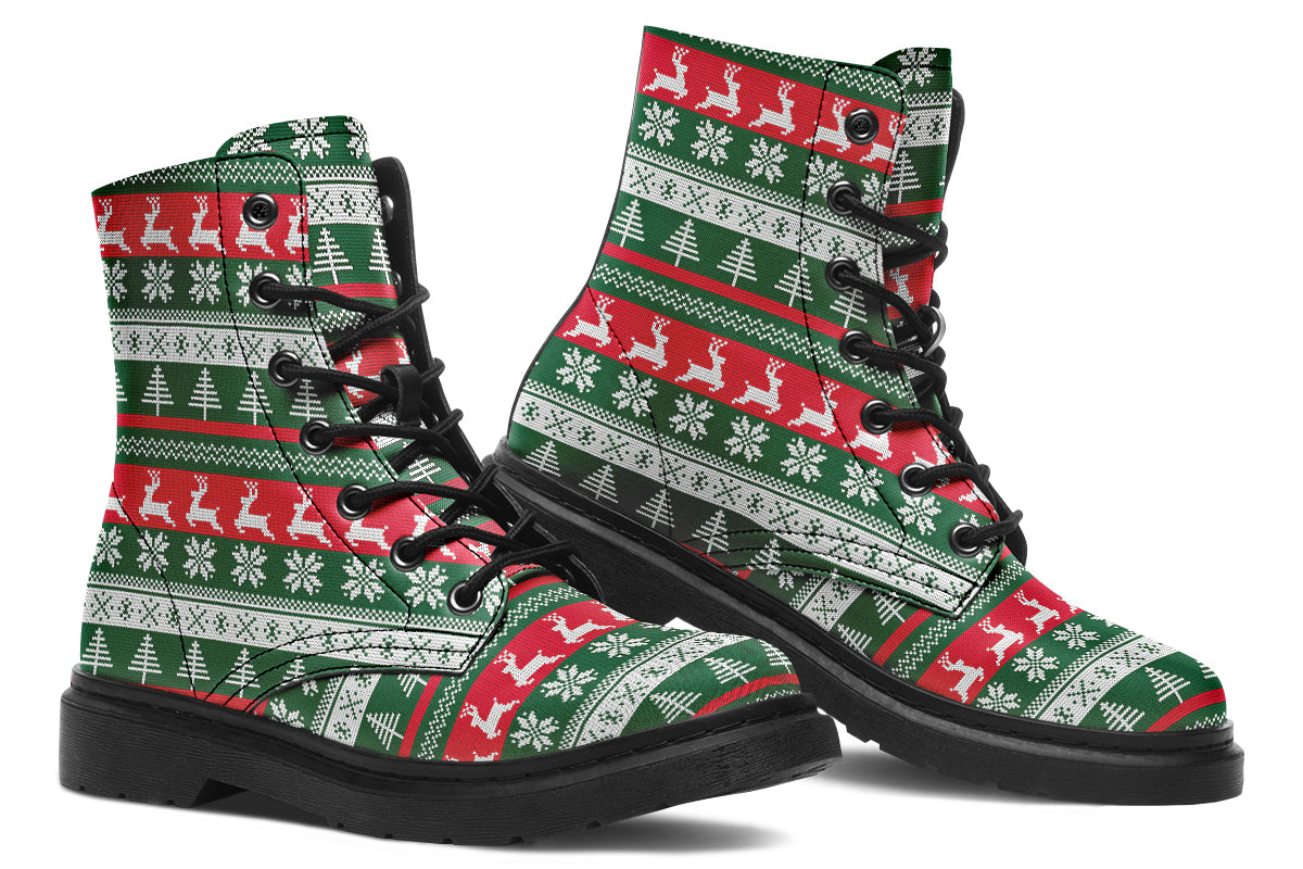 Boots with a red, white and green Christmas pattern in the style of “ugly Christmas sweaters”. The pattern features reindeers, snowflakes and Christmas trees.