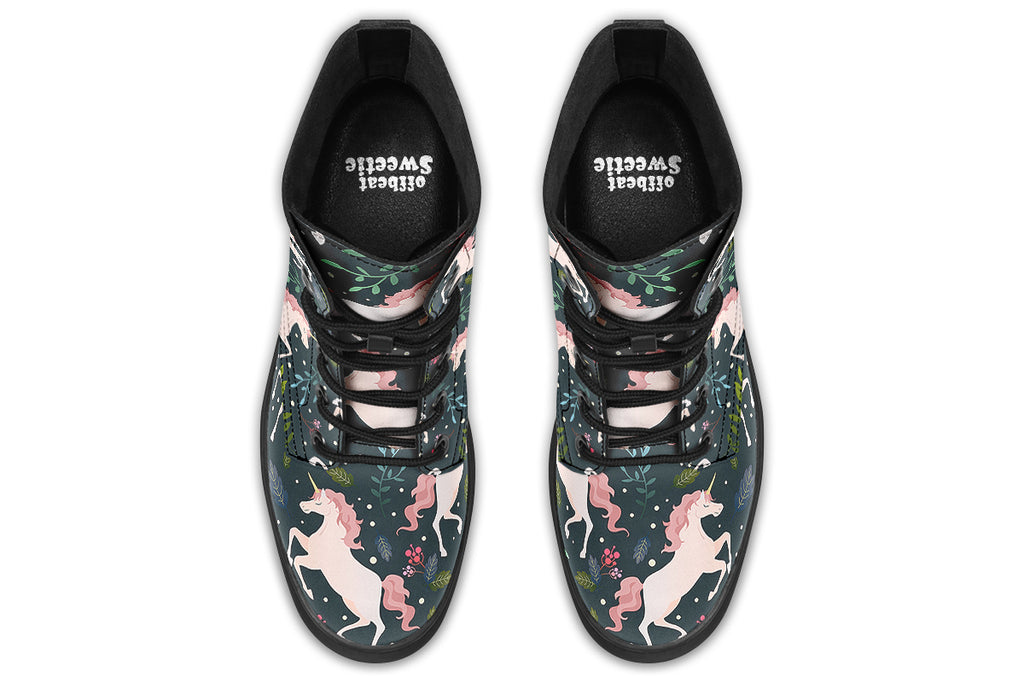 Dark green boots with a pattern of white unicorns, green leafs and pink flowers