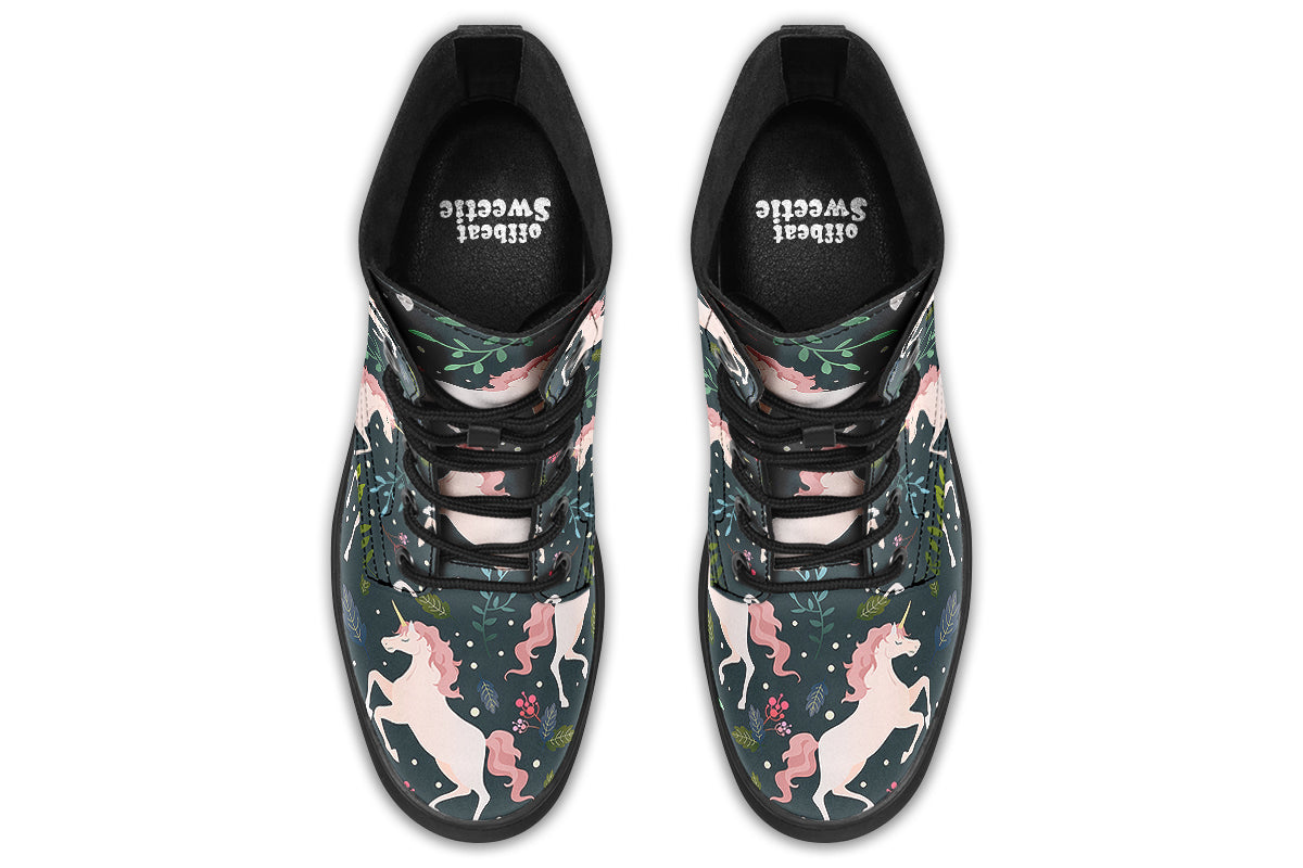 Dark green boots with a pattern of white unicorns, green leafs and pink flowers