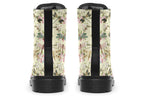 Yellowish/beige coloured boots featuring a vintage-looking pattern of dragonflies and pink and white flowers.