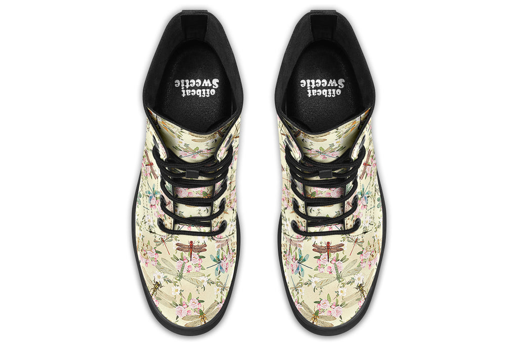 Yellowish/beige coloured boots featuring a vintage-looking pattern of dragonflies and pink and white flowers.