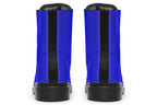 Solid blue boots with a black sole