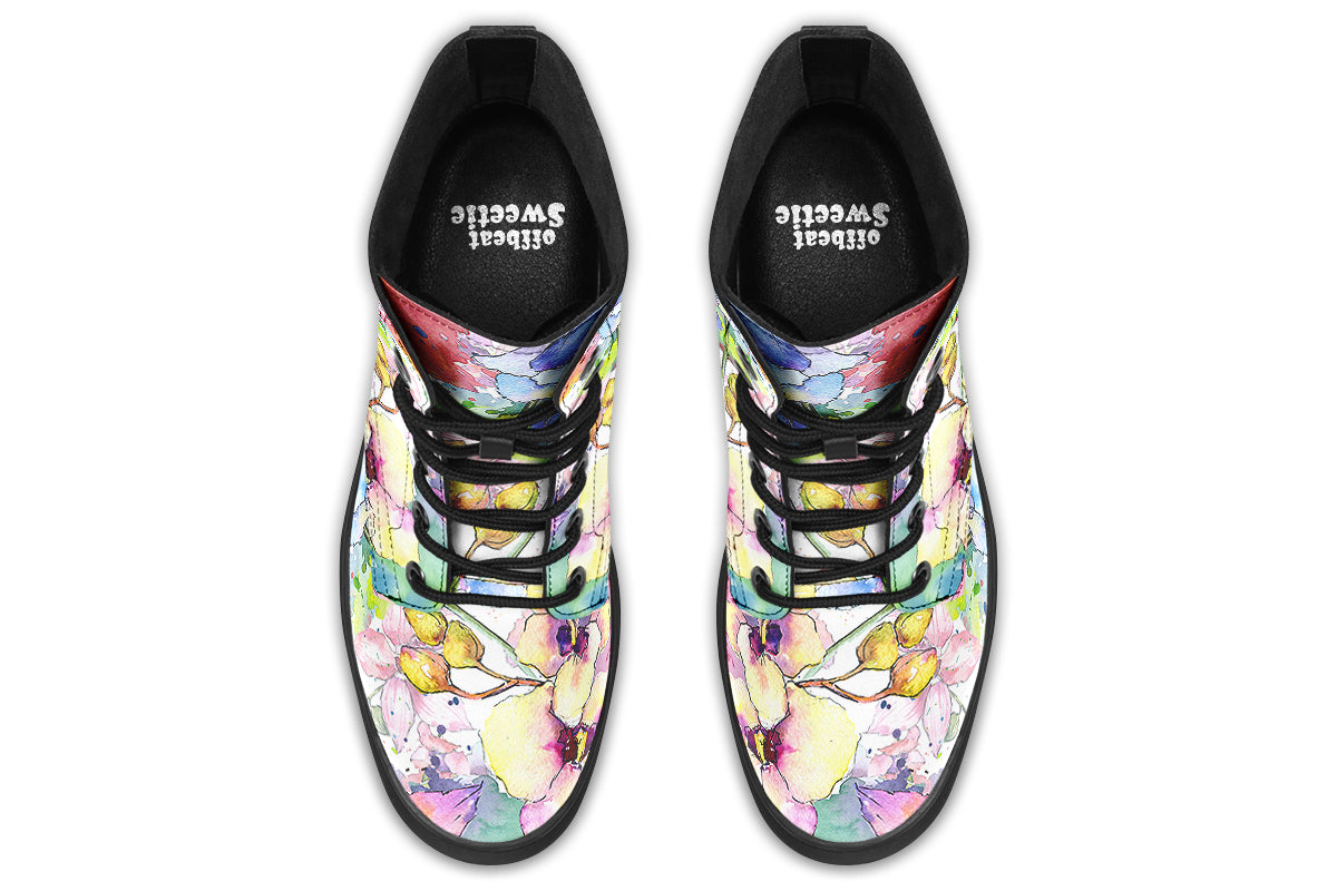 White coloured boots with a lovely pattern of different coloured flowers in the style of a watercolour painting