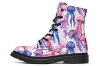 Design features pink, blue and purple watercolour-style jellyfish on a white background
