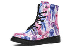 Design features pink, blue and purple watercolour-style jellyfish on a white background