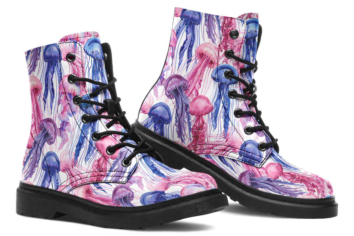 Design features pink, blue and purple watercolour-style jellyfish on a white background