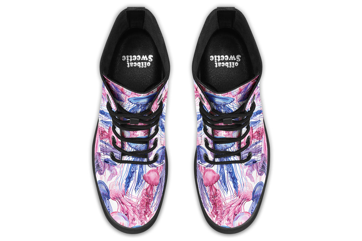 Design features pink, blue and purple watercolour-style jellyfish on a white background