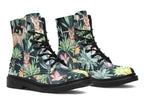 Boots featuring a pattern of Australian wildlife such as quokkas and kangaroos against a green leafy background
