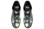Boots featuring a pattern of Australian wildlife such as quokkas and kangaroos against a green leafy background
