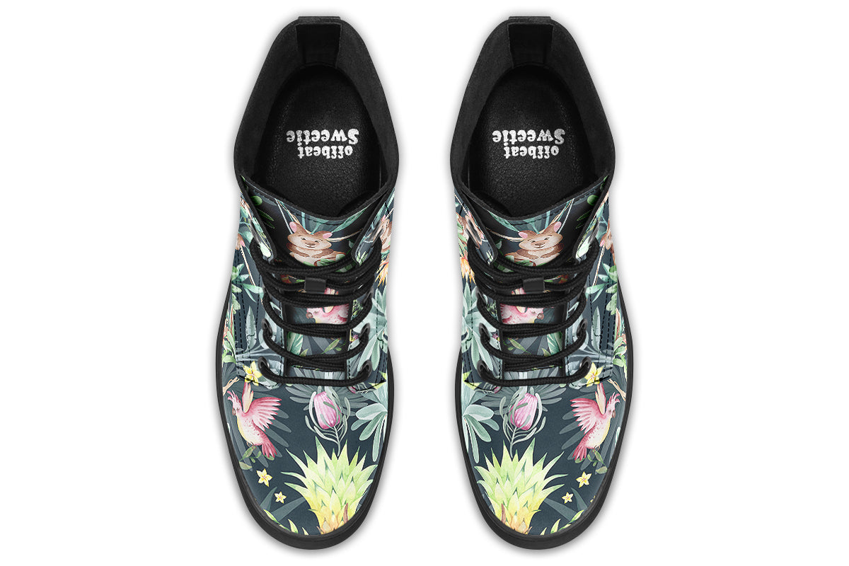 Boots featuring a pattern of Australian wildlife such as quokkas and kangaroos against a green leafy background