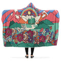 Colorful hooded blanket with a retro-style rainbow, nature and floral design.