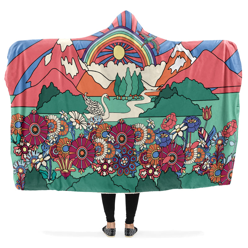 Colorful hooded blanket with a retro-style rainbow, nature and floral design.
