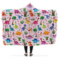 Hooded blanket with colorful dinosaur pattern on a pink background