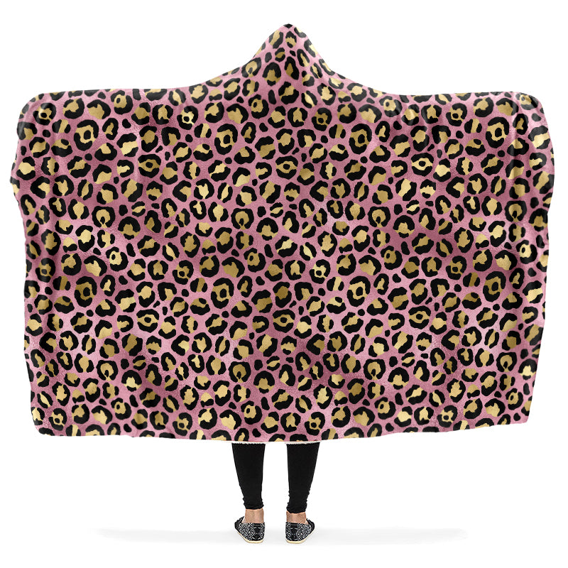 Hooded blanket with gold leopard print on a pink background