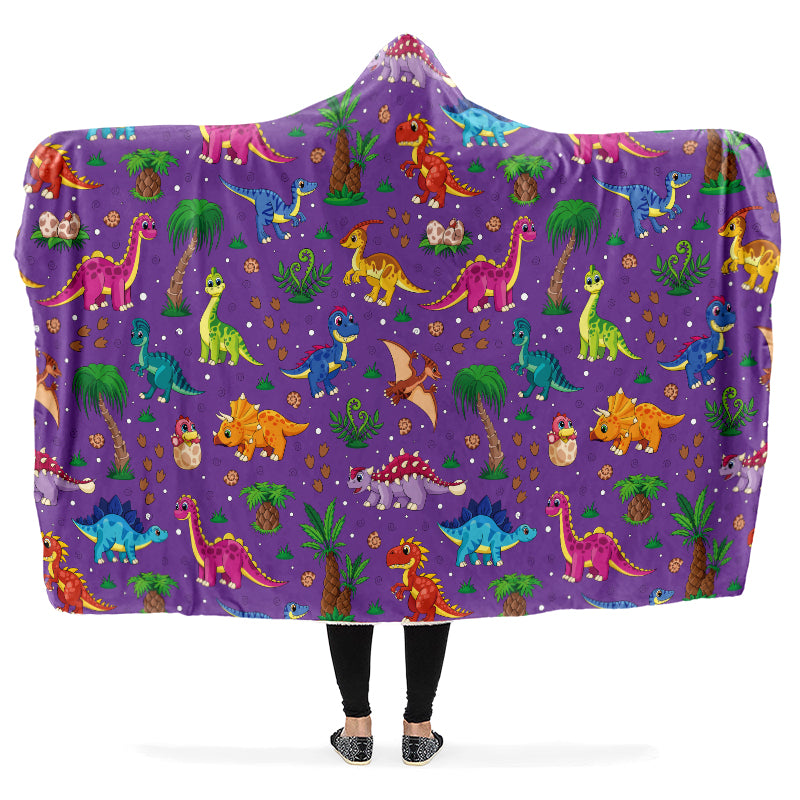Hooded blanket with colorful dinosaur pattern on a purple background