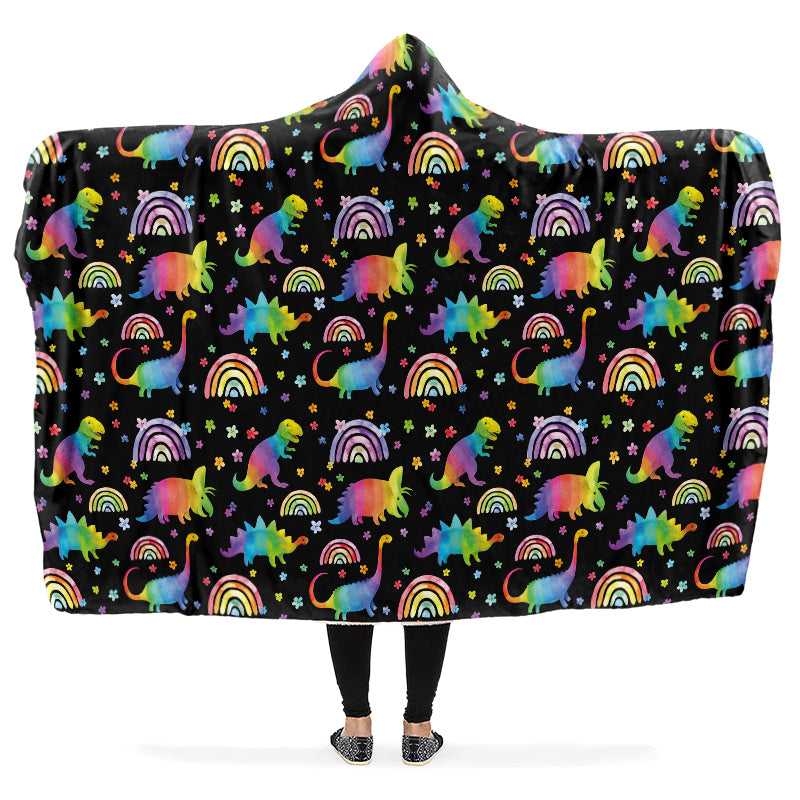 Hooded blanket with colorful dinosaur and rainbow pattern on a black background