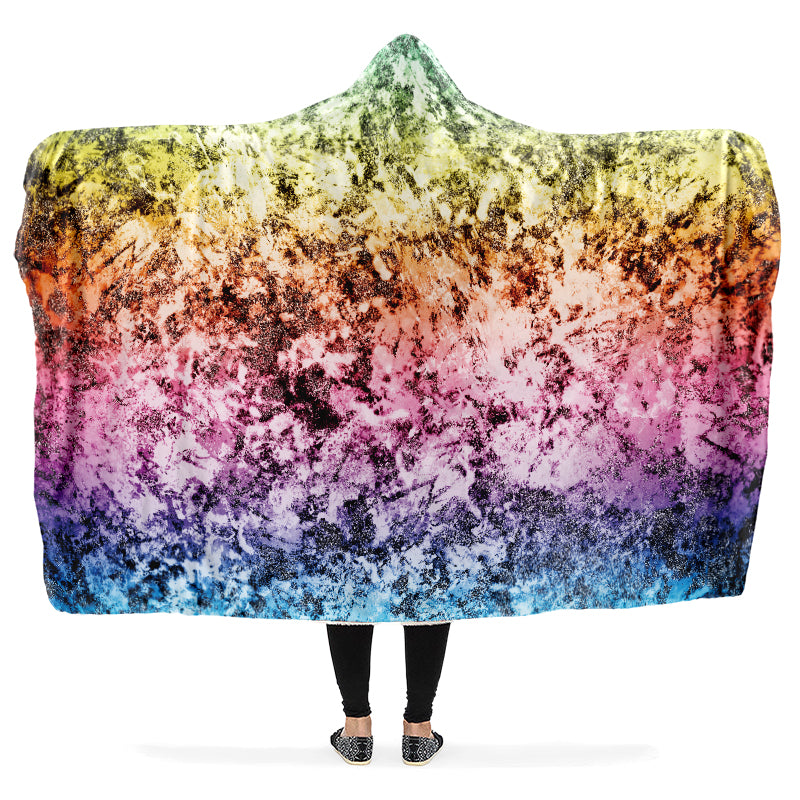Multicolored hooded blanket with a gradient rainbow design.