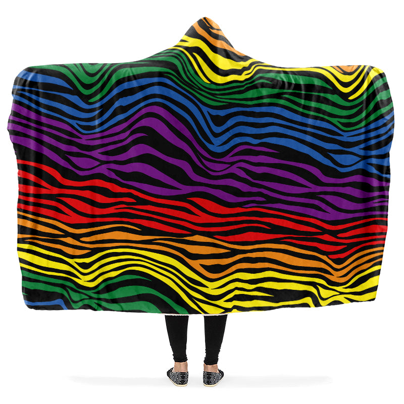 Colorful wavy zebra stripe patterned hooded blanket draped over a person.