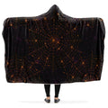 Black hooded blanket with bronze spider web pattern.