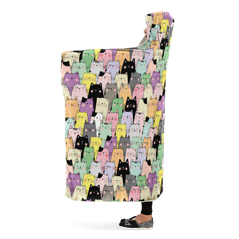 Hooded blanket with colorful cat pattern. Side view.