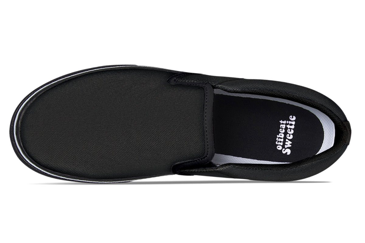 Black and White Mismatch Slip Ons