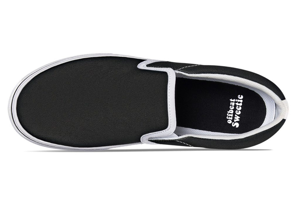 Black and White Mismatch Slip Ons