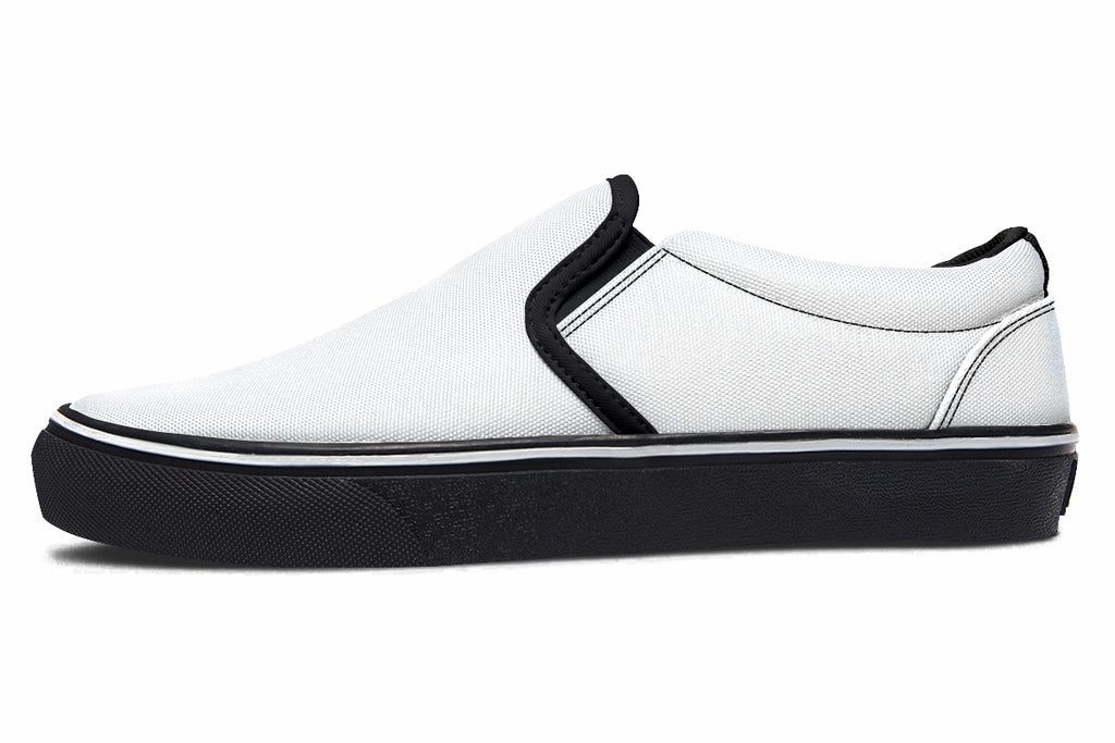 Black and White Mismatch Slip Ons